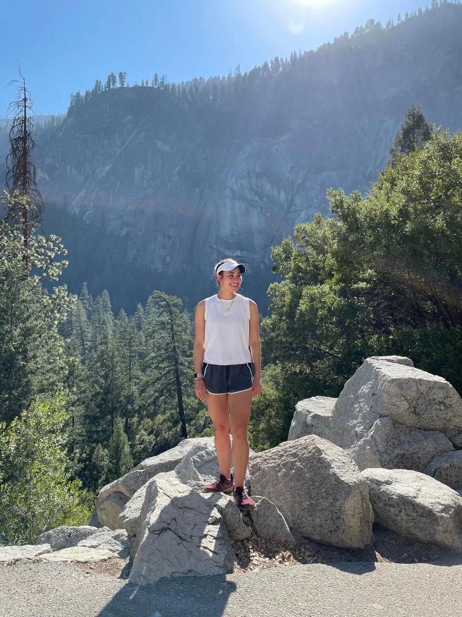 Mafe on granite boulders in the mountains, athletic wear