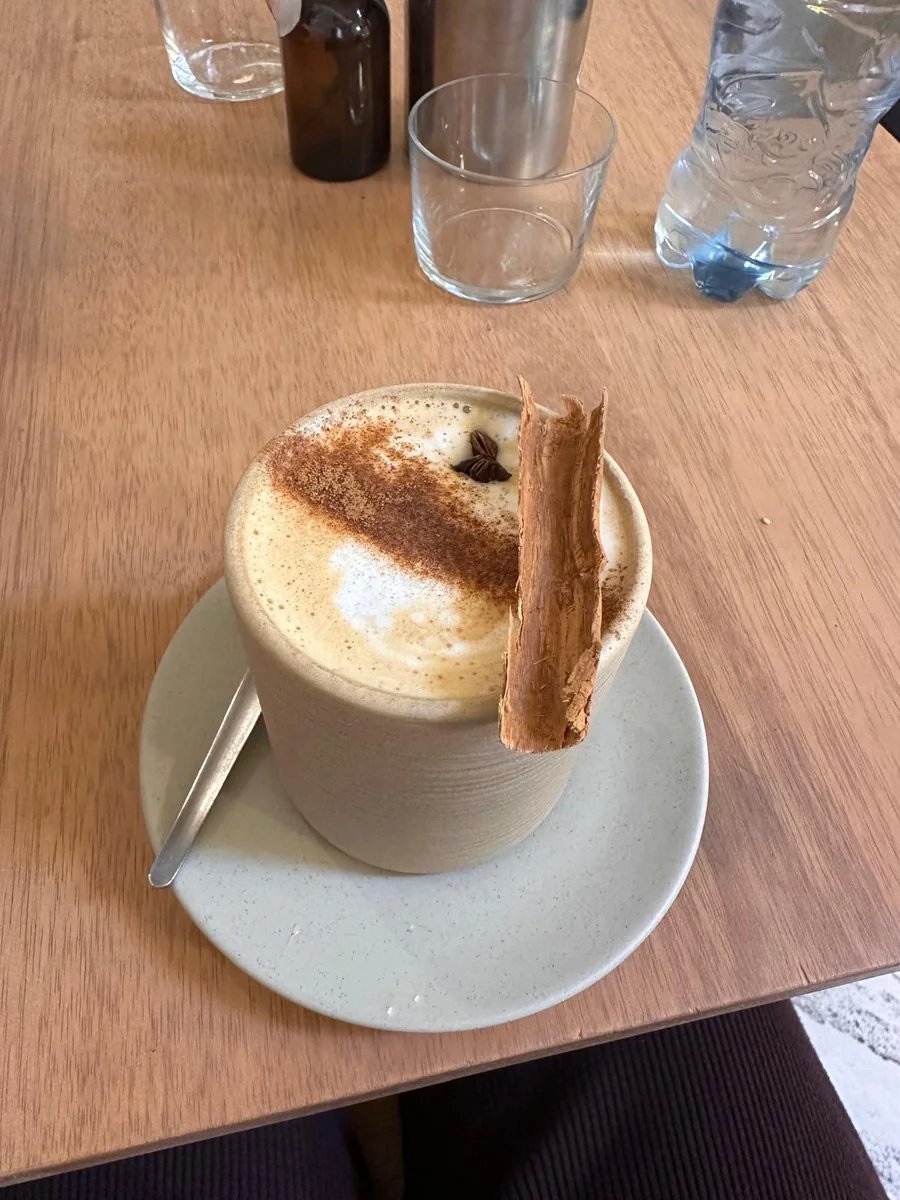 Latte with cinnamon and star anise, food content